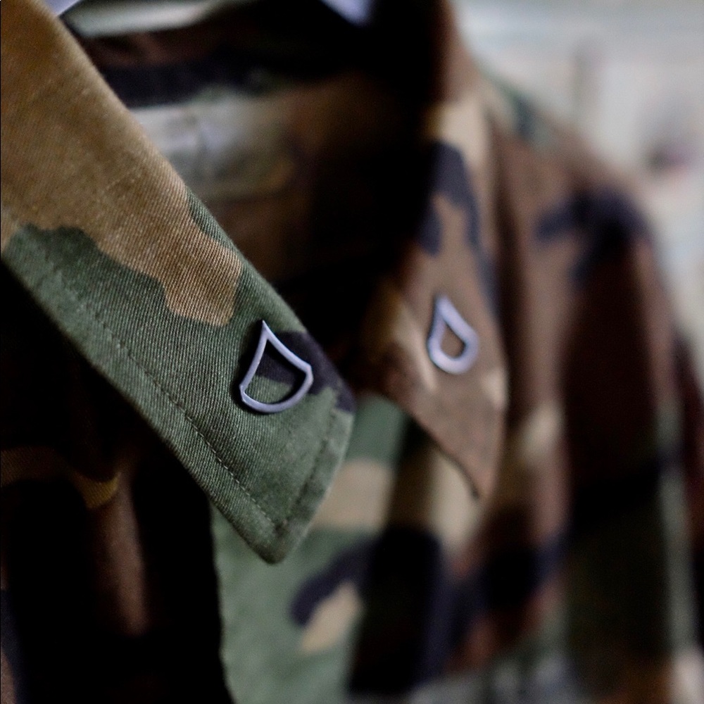 Woodland Camouflage Coat; US Army; lapel pins and shoulder patches. Chore jacket